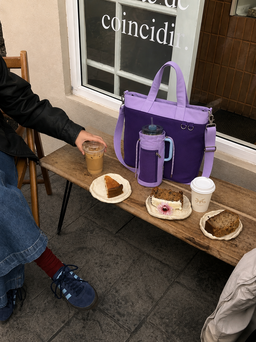 Purple water bottle tote bag at a cafe with 40oz water bottle